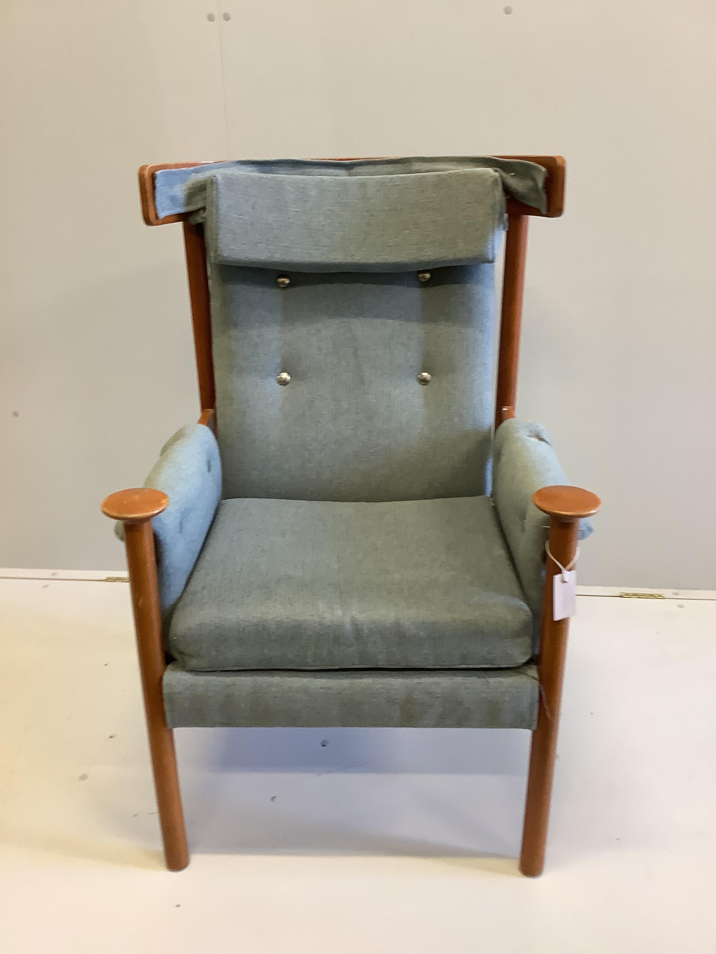 A mid century Parker Knoll upholstered beech “Bwana” style armchair, width 71cm, depth 65cm, height 108cm